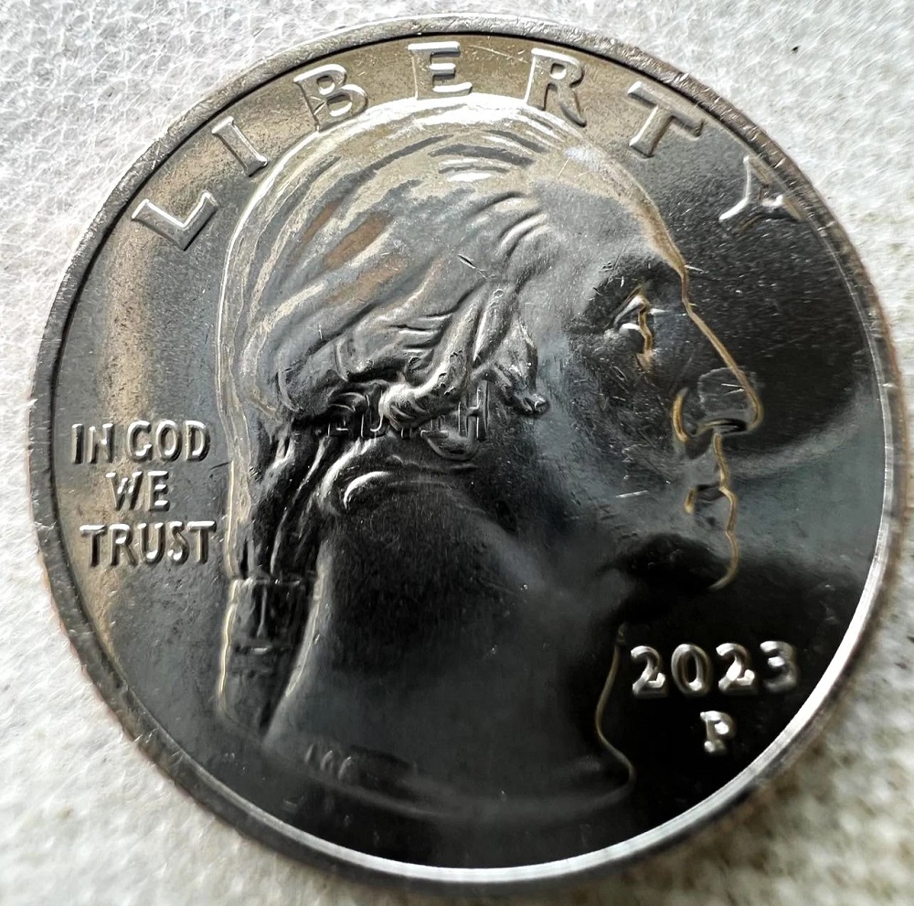 2023-P Edith Kanakaole quarter clashed die error showing ghost EDITH lettering on Washington's obverse portrait